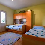 The Consists Of Two Bedrooms, A Bathroom, A Kitchen And A Living