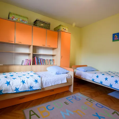 The Consists Of Two Bedrooms, A Bathroom, A Kitchen And A Living Appartamento