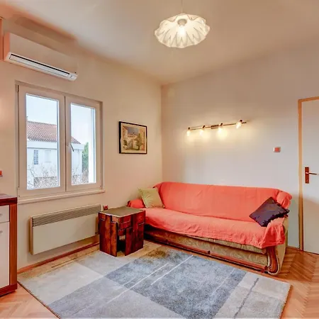 The Consists Of Two Bedrooms, A Bathroom, A Kitchen And A Living Appartement